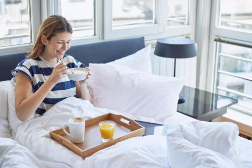 Lady breakfast in bed