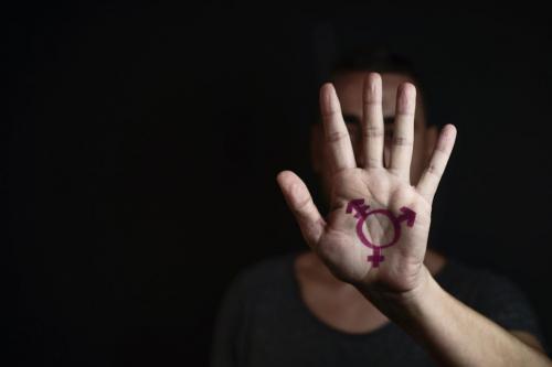 Hand with transgender symbol
