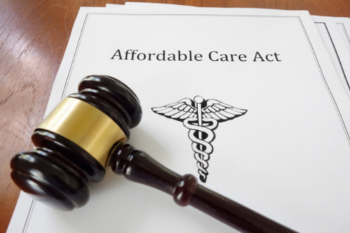 Affordable Care Act papers with gavel