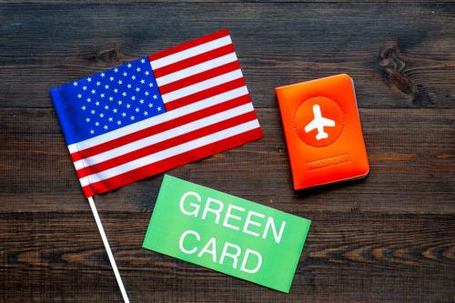 American flag and green card